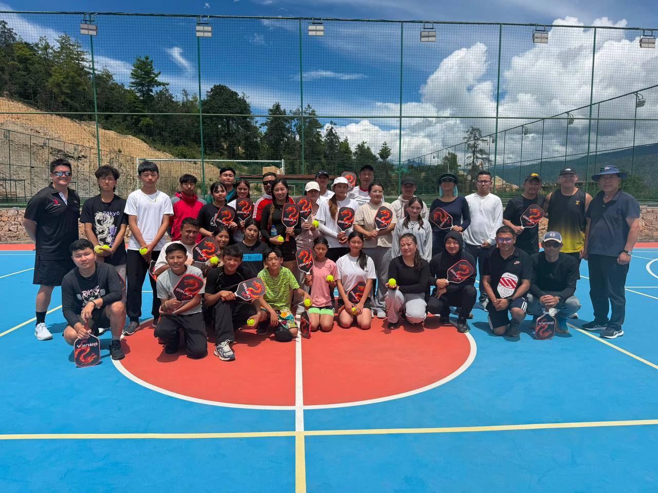 Young pickleball coaches and students taking part in the Metazone Sports programme in Bhutan